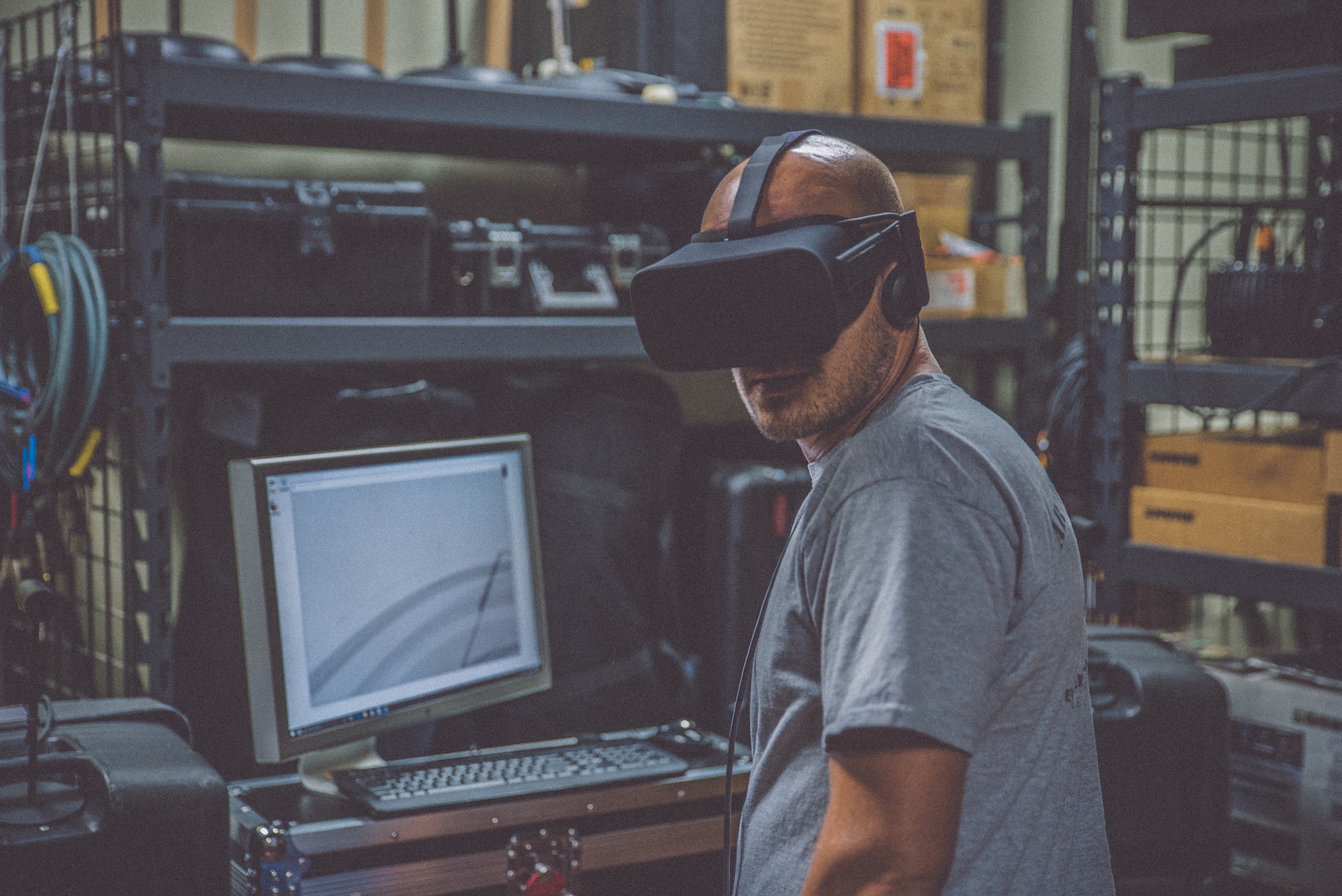 A man uses virtual reality video for employee training. 